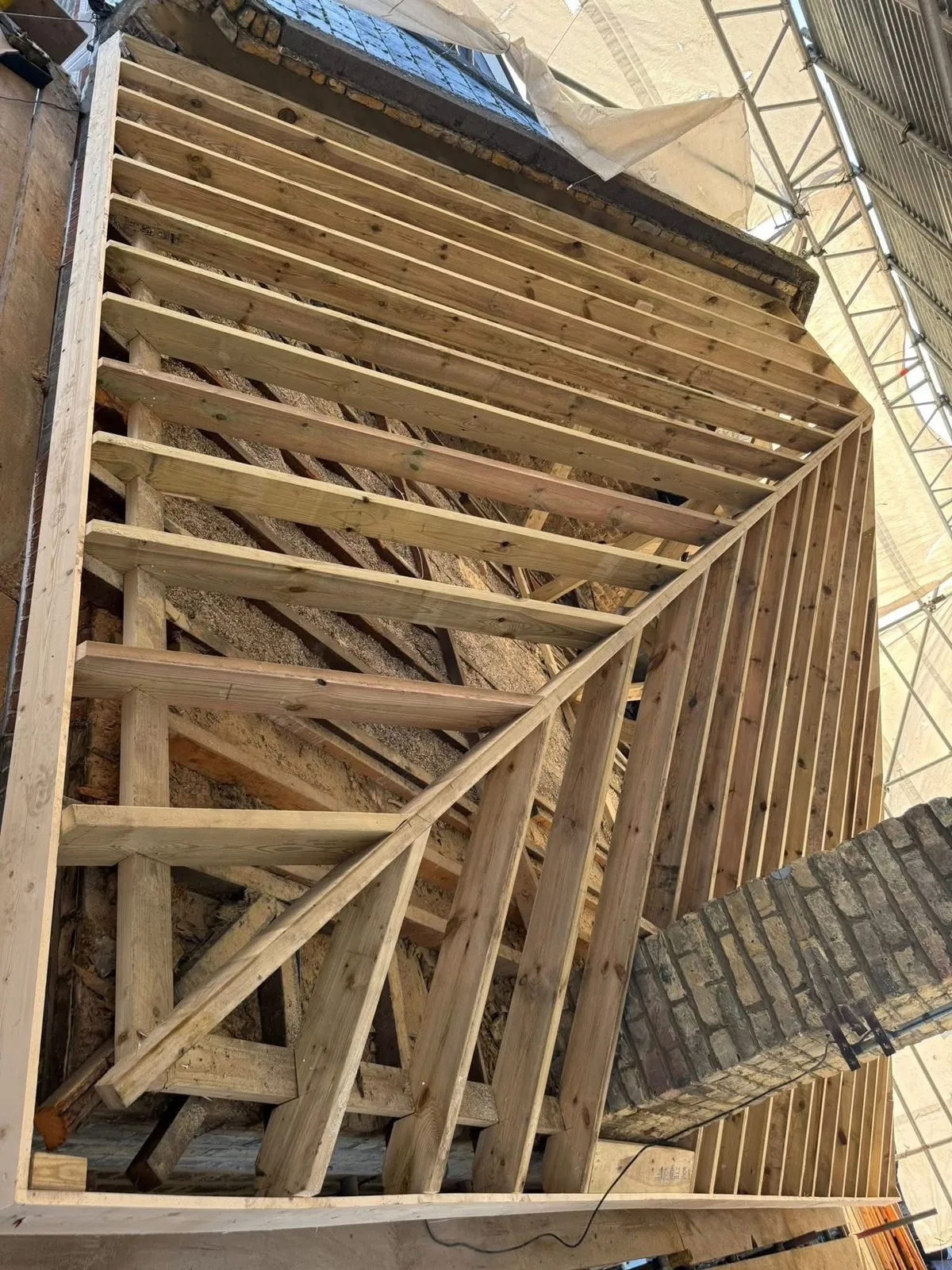New roof timbers and rafters during a re-roof in Okehampton