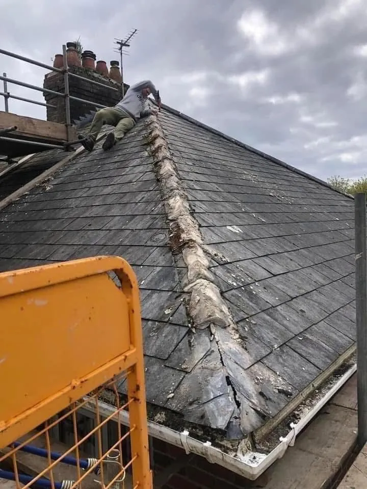 Slate roof ridge and chimney repair in Okehampton